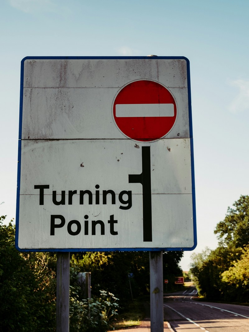 Road sign indicating no entry and a turning point